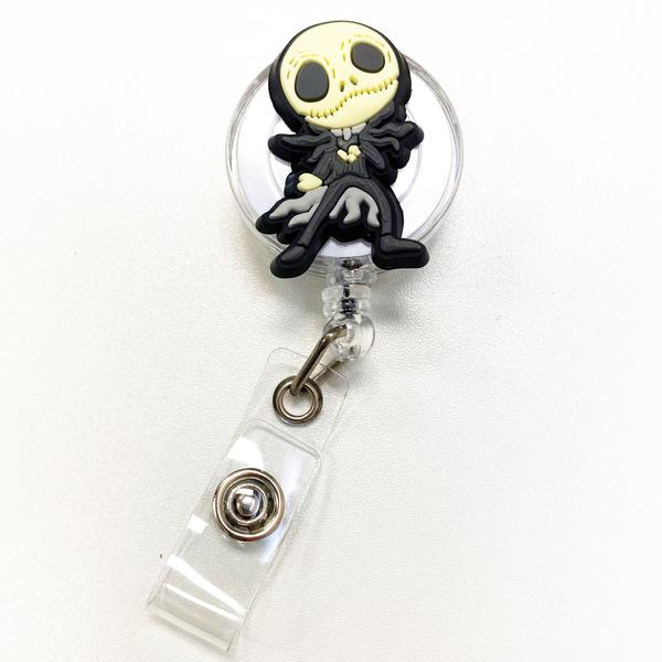 CHARACTER BADGE REEL/POUCH