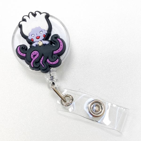 CHARACTER BADGE REEL/POUCH