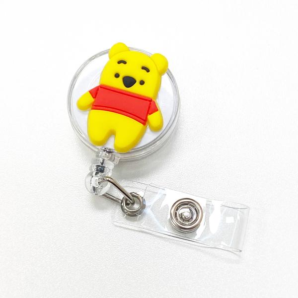 CHARACTER BADGE REEL/POUCH